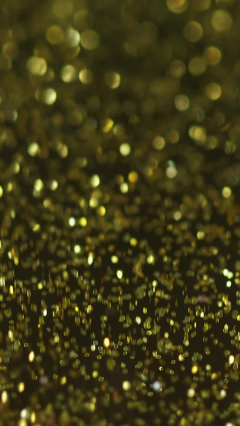 Vertical Glitter gel spill sparkling fluid golden gloss Video stock 285337144