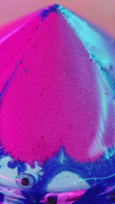 Vertical glitter gemstone shiny ink drip pink blue Stock Footage 290286562