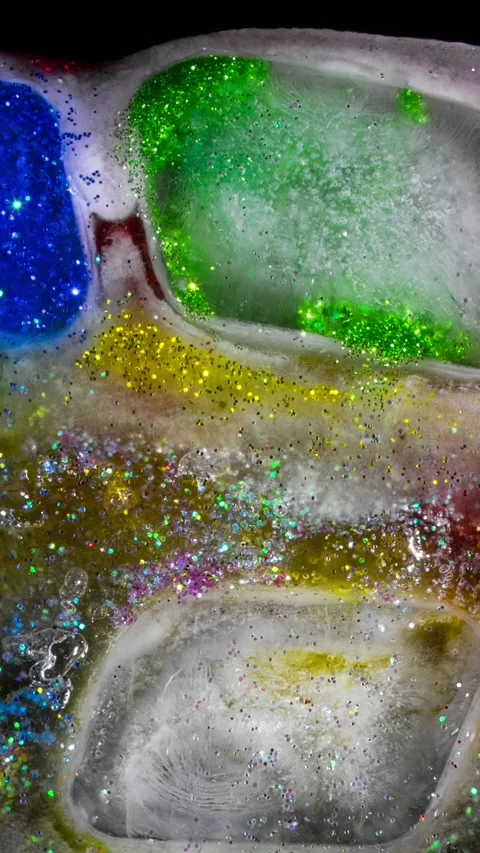 Vertical Glitter Ice Melting Time Lapse Abstract Background Stock Footage 337328297