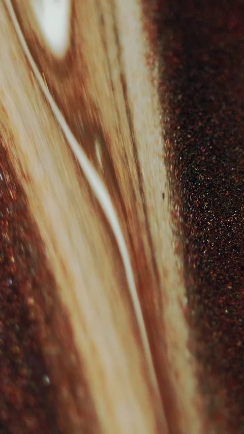 Vertical Glitter ink drip paint pouring brown white spill Stock Footage 274460709
