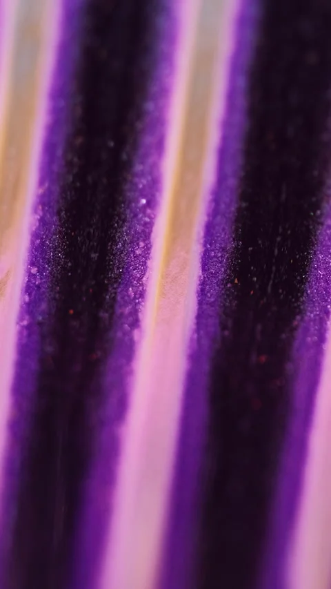Vertical Glitter ink drip paint spill purple stripe texture Video stock 283320553