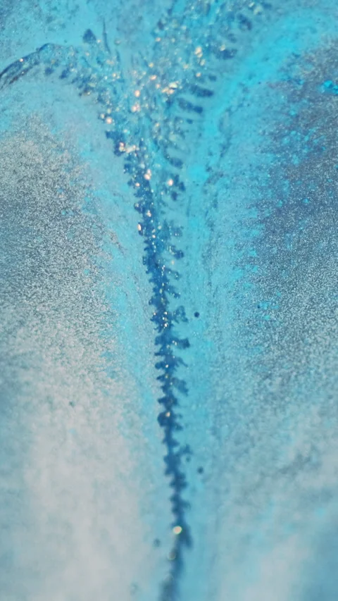 Vertical glitter ink drip paint spill blue white Stock Footage 285472618