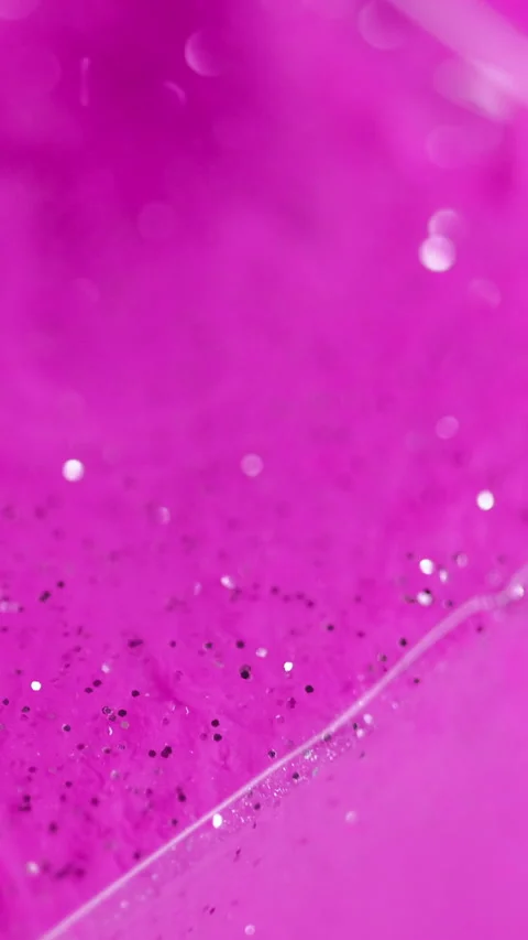Vertical glitter ink shimmering spill pink cube Stock Footage 285472072