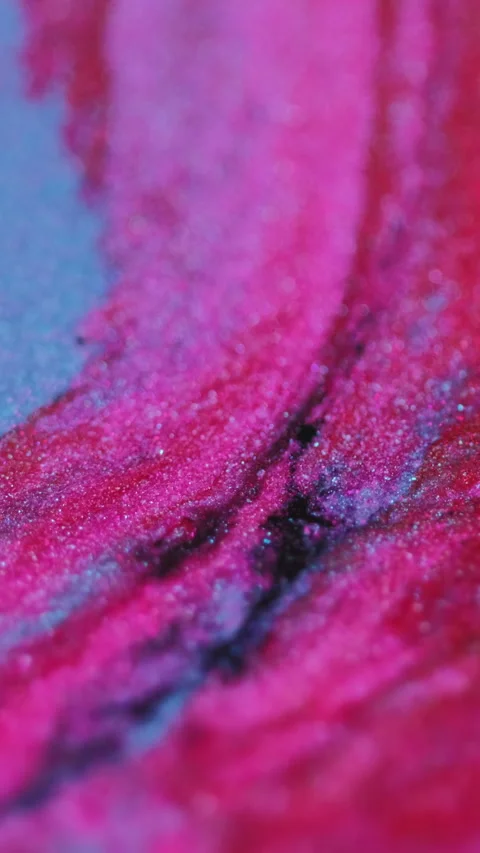 Vertical Glitter ink wave shimmering fluid pink blue paint Video stock 280095167