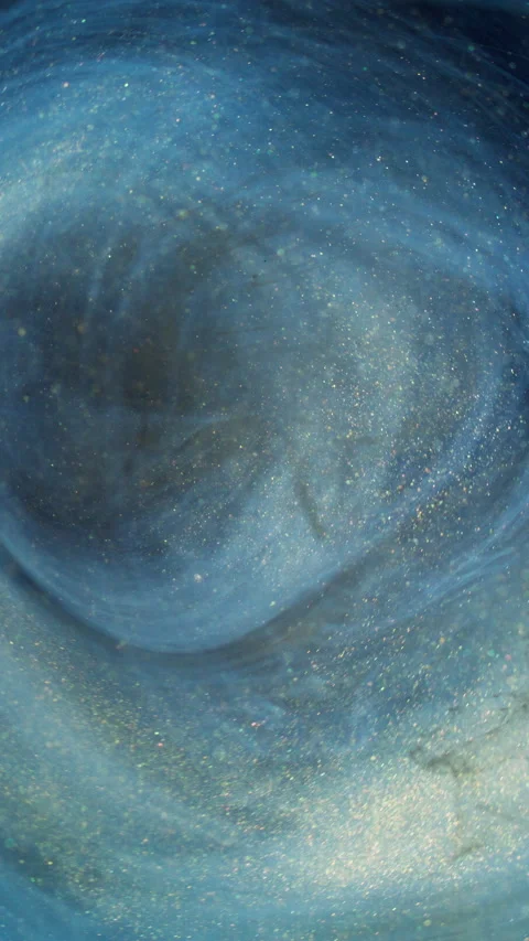 Vertical glitter mist ink swirl blue golden paint Vídeos de archivo 296141966