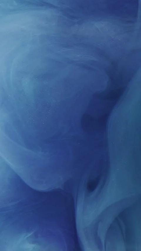 Vertical glitter mist swirl paint water blue vapor Stock Footage 314227305