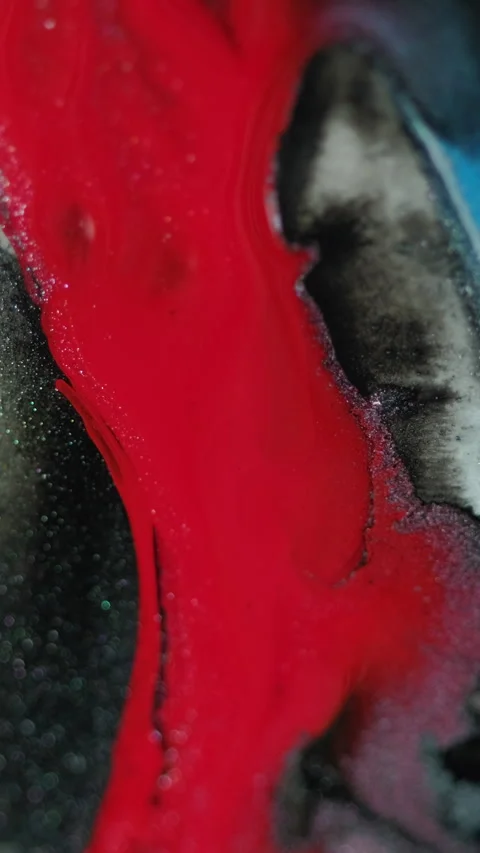 Vertical Glitter paint drip ink spill red blue fluid drop Video stock 277239323