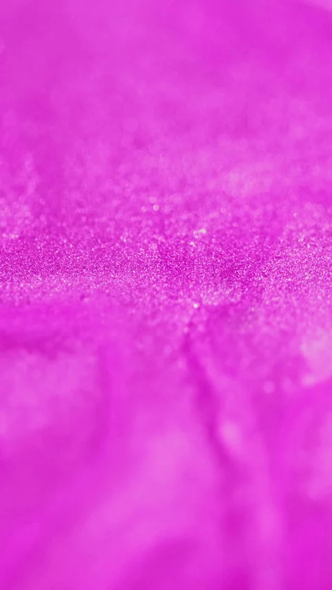 Vertical glitter paint shimmering fluid pink spill Video stock 284193849