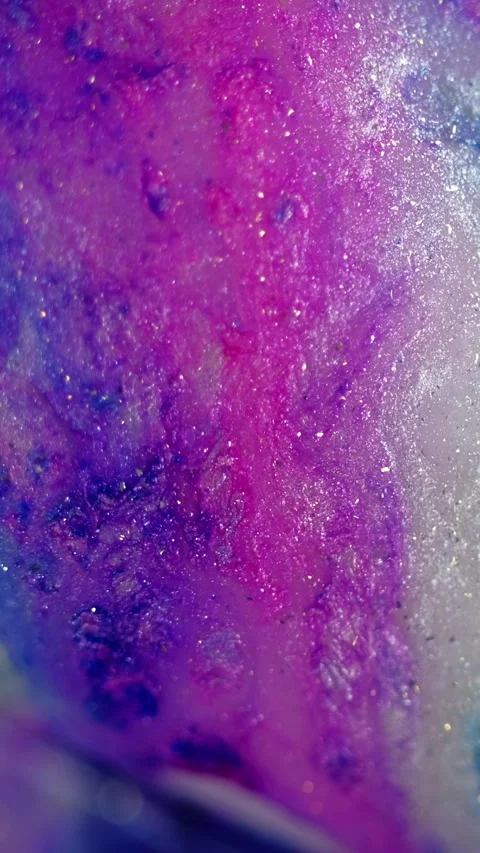 Vertical glitter paint spill ink drip blue pink Stock Footage 284788454