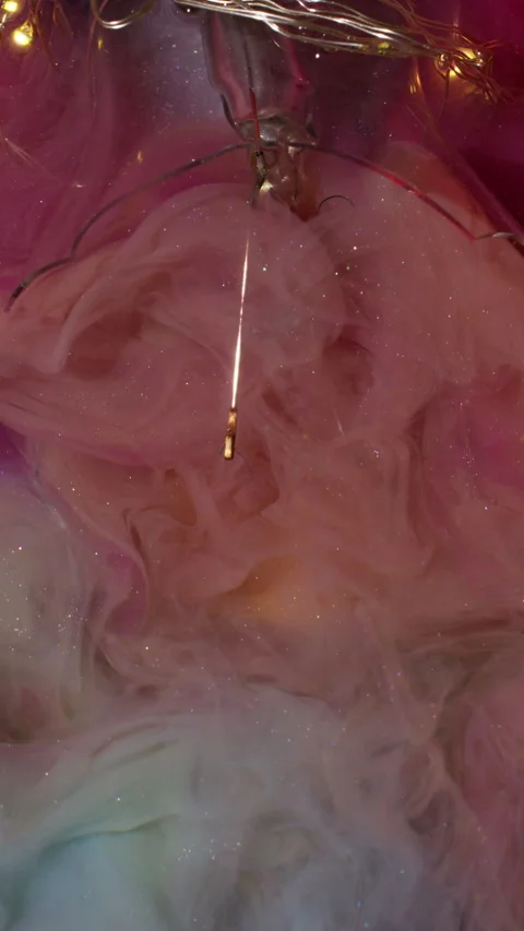 Vertical glittery flow paint explode light bulb Stock Footage 315080877