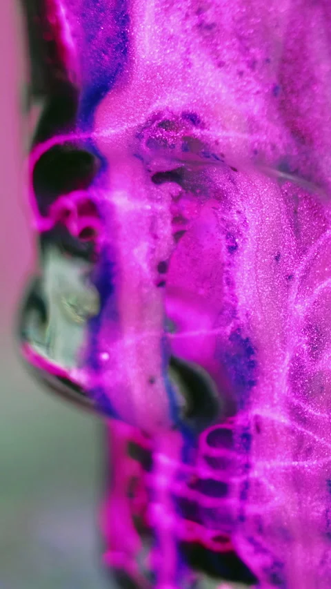 Vertical glowing paint neon ink flow pink skull Stock Footage 290832222