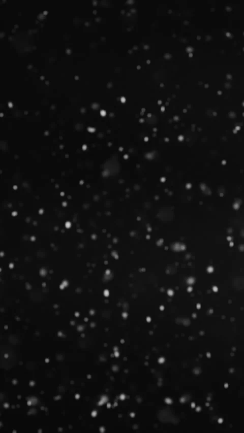 Vertical glowing snowfall winter night ice flakes Stock Footage 255262043