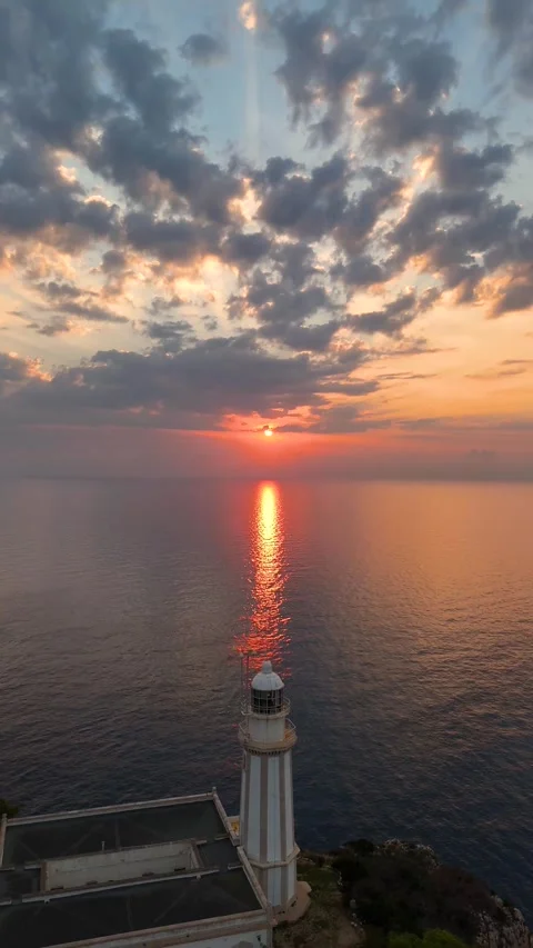 Vertical Golden Hour Sunset at Lighthouse - Costa Blanca Aerial 4K 動画素材 337350363