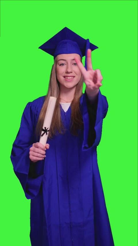 Vertical Graduated student showing peace sign on green screen Stock Footage 302401723