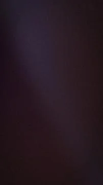 Vertical grainy abstract background with dark purple, charcoal and black Stock Illustration
