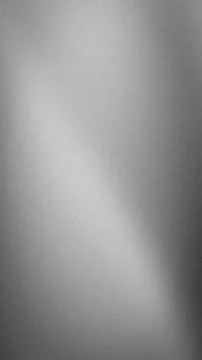 Vertical grainy gray gradient background with smooth blur tech grunge wallp.. Stock Photos