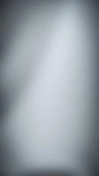 Vertical gray grainy abstract background gradient with light and dark shade.. Stock Photos