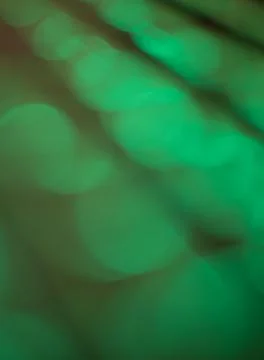 Vertical green bokeh background texture Stock Illustration