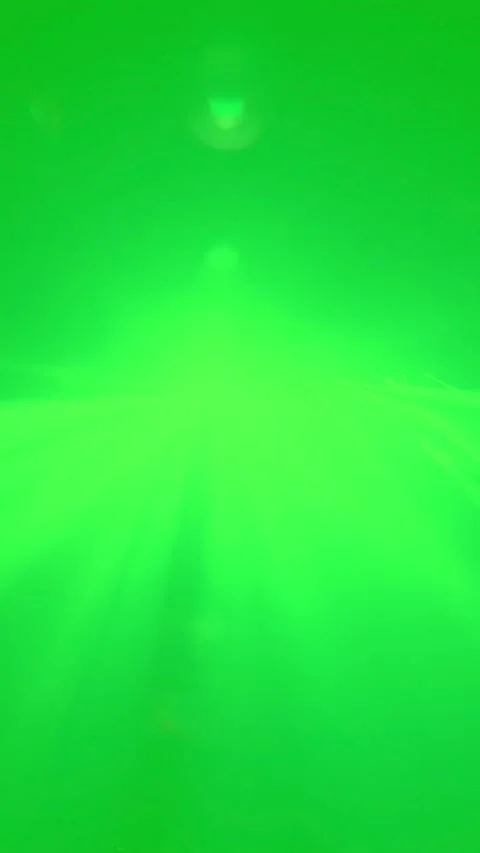 Vertical green light beams flashing on green screen background Stock Footage 339992368