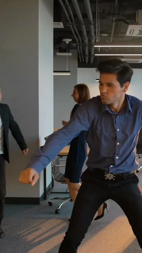 Vertical of Group of funny emploees dancing in office Stock Footage 277281897