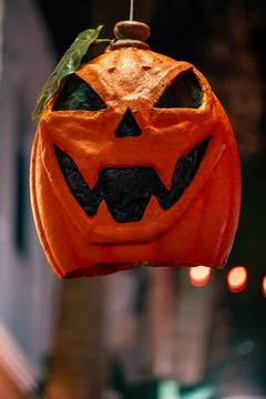 Vertical Halloween Jack-O’-Lantern Decoration with Leaf Accent Stock Photos