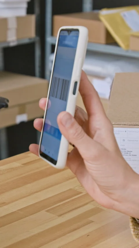 Vertical Hand of Client Showing Barcode on Smartphone at Parcel Pickup Outlet Video stock 321495999