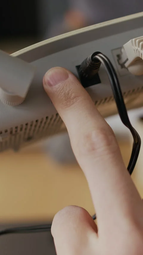 Vertical of Hand Resetting Wifi Router while Troubleshooting Lost Connection Stock Footage 332446440