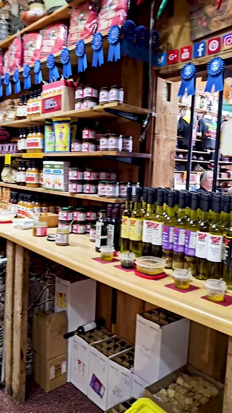 Vertical handheld video of Rustlin' Rob's Texas Gourmet Foods in Stock Footage 318715746