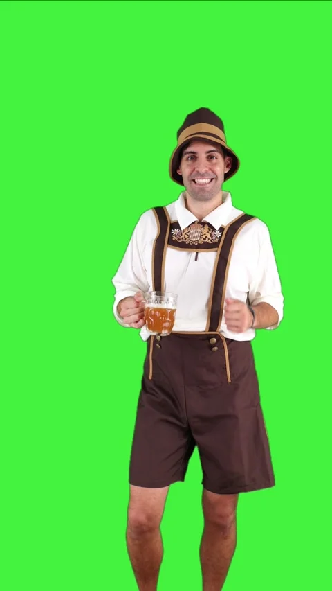 Vertical happy young bavarian man dancing with beer glass at oktoberfest ch.. Stock Footage 281192353