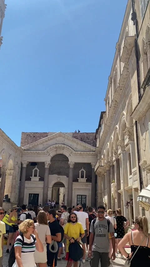 Vertical HD - Cathedral Bell Tower Peristyle Diocletian Palace Split Tourists Stock-Footage 345278080