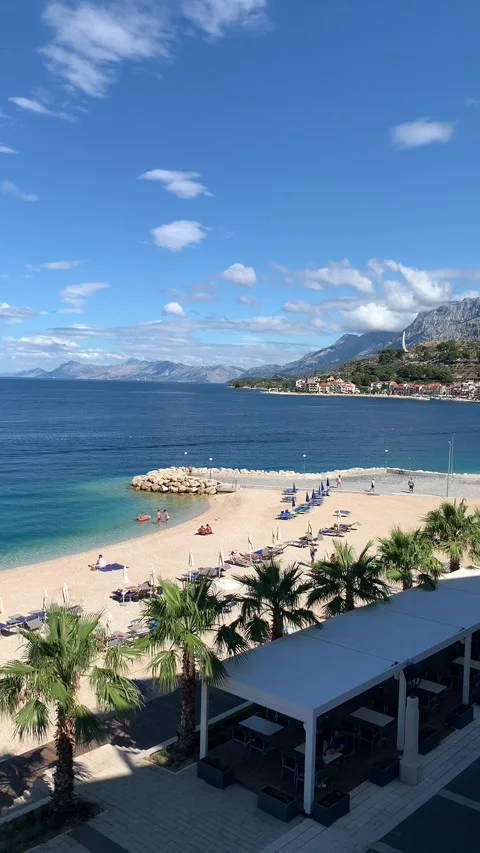 Vertical HD - Elevated Beach View Palms Biokovo Mountains Podgora Sound Video stock 345278056