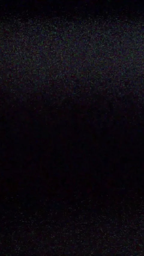 Vertical heavy VHS vintage old TV glitch noise tape on black background Stock Footage 337607825