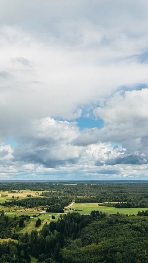 Vertical high altitude hyperlapse view of summer storm clouds developing over 库存影片 341851472
