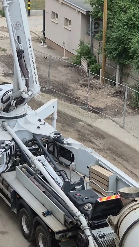 Vertical High Angle Concrete Mixer Truck And Pump Boom 9x16 Budapest Stock-Footage 336333103