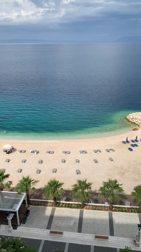 Vertical - High Angle View Of Beach And Sea In Podgora Croatia Riviera Video stock 345278017