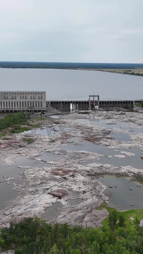 Vertical High Wide Drone Approach Seven Sisters Hydro Station Manitoba Stock Footage 345150244
