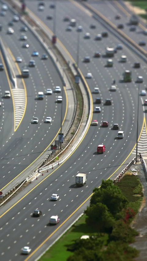 Vertical highway traffic with tilt shift miniature effect Stock Footage 340472051