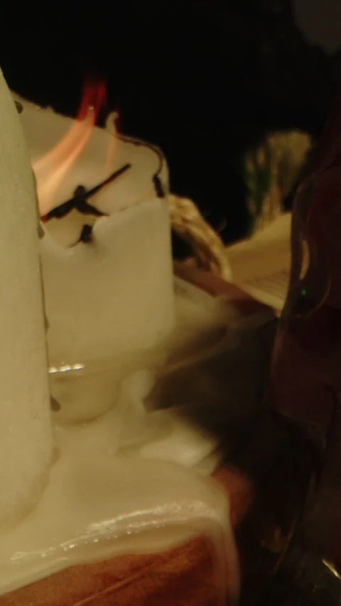 Vertical Horror concept: Dolly from a blood filled glass skull to burning Stock Footage 336371694