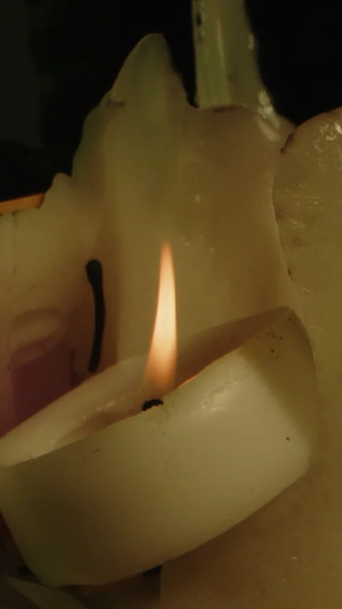 Vertical Horror concept: Dolly of burning candles and a blood filled glass Stock Footage 336001603