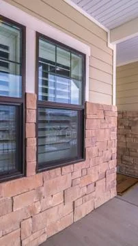 Vertical House windows with internal louvers day light Photos