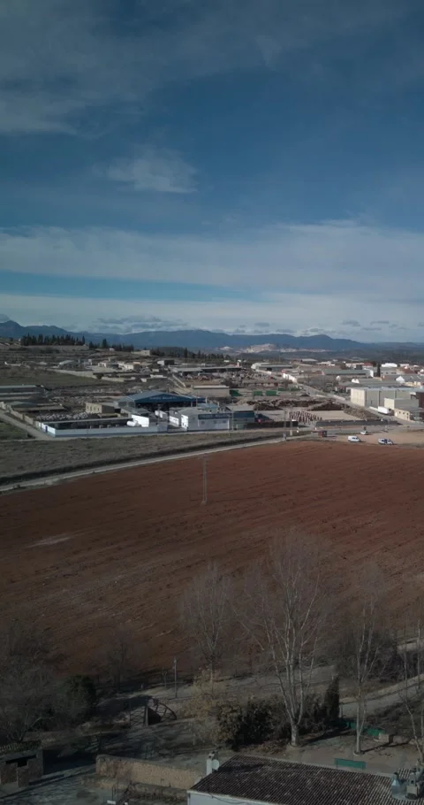 Vertical Hyperlapse Drone Reveal of Bullas Industrial Area and Camping Video stock 335912862