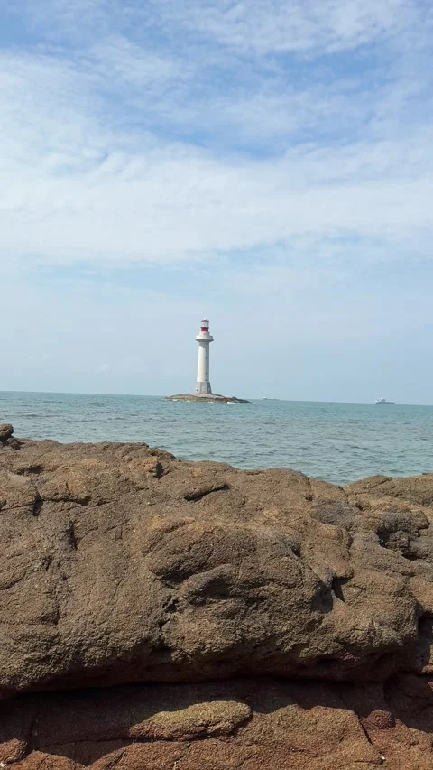 Vertical - Iconic White Lighthouse in the Ocean Near Sanya Coast Stock-Footage 330845227