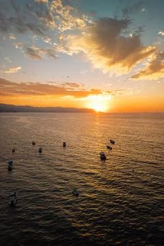 Vertical idyllic sunset view as seen from an aerial view near Los Muertos B.. Stock Photos