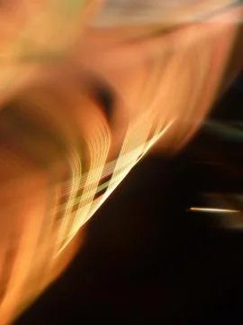 A vertical illustration of bright progressive rhythmic light threads with hig Illustrazione stock