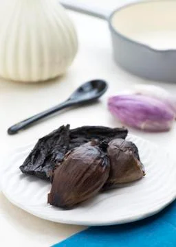 Vertical image of black onions Stock Photos