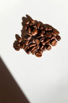 Vertical image of coffee beans on a clean white background. coffee beans ve.. Stock Photos