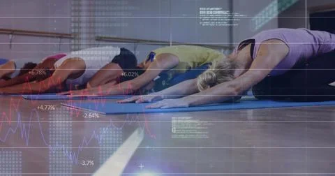 Vertical image: Diverse class settling on blue mats, holding child pose in Stockfoto's