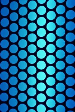 Vertical image of geometric pattern of the elevator ceiling in vibrant blue Stock Photos