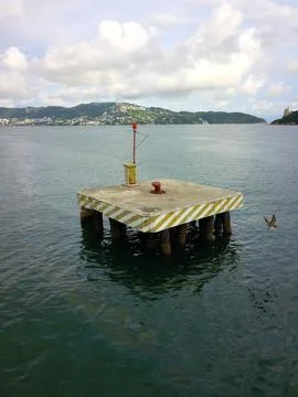 Vertical Image of a marine platform in the middle of Acapulco Bay Stock Photos