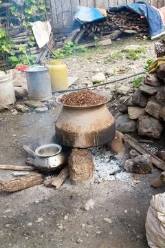 Vertical image of traditional cooking tools outdoors in Chitwan, Nepal Stock Photos